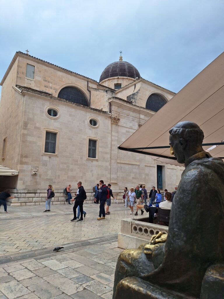 Dubrovnik Cathedral and Marin Držić statue in Dubrovnik Old Town square