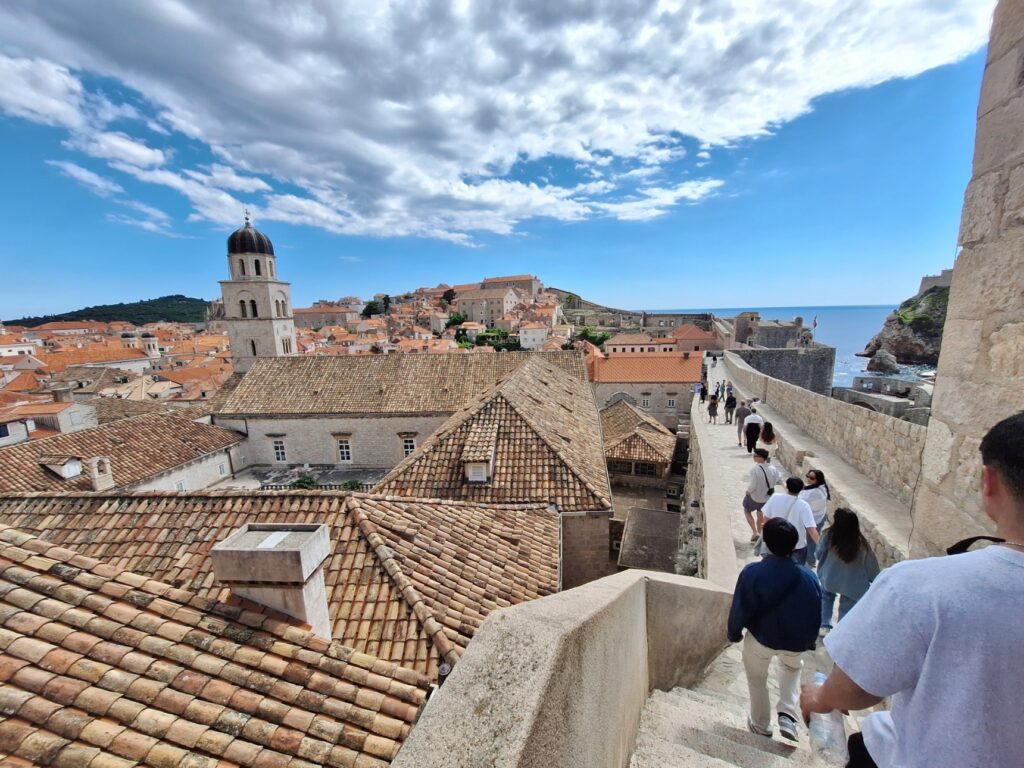 Dubrovnik city walls walking path overlooking Old Town rooftops