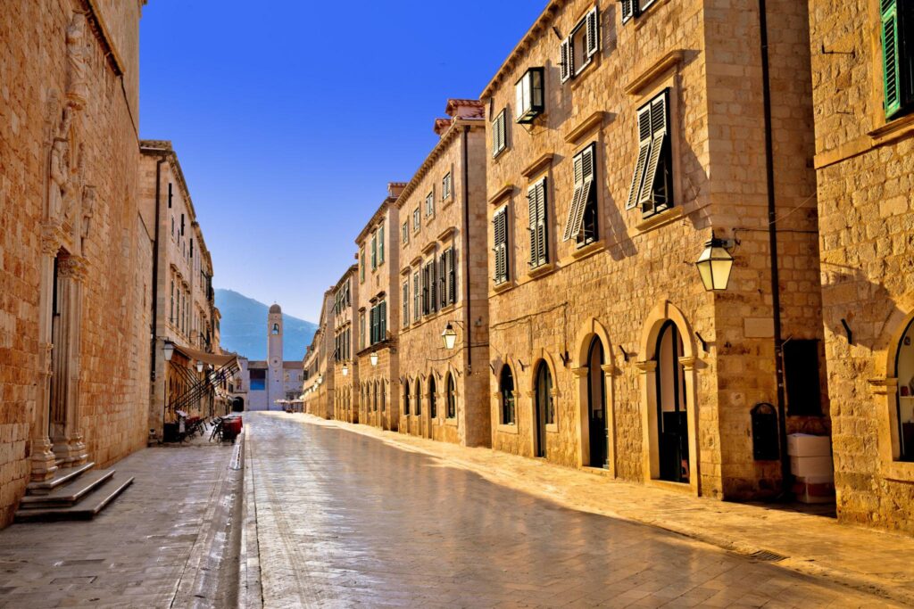 Stradun street in Dubrovnik Old Town during a quiet morning walking tour for cruise passengers.