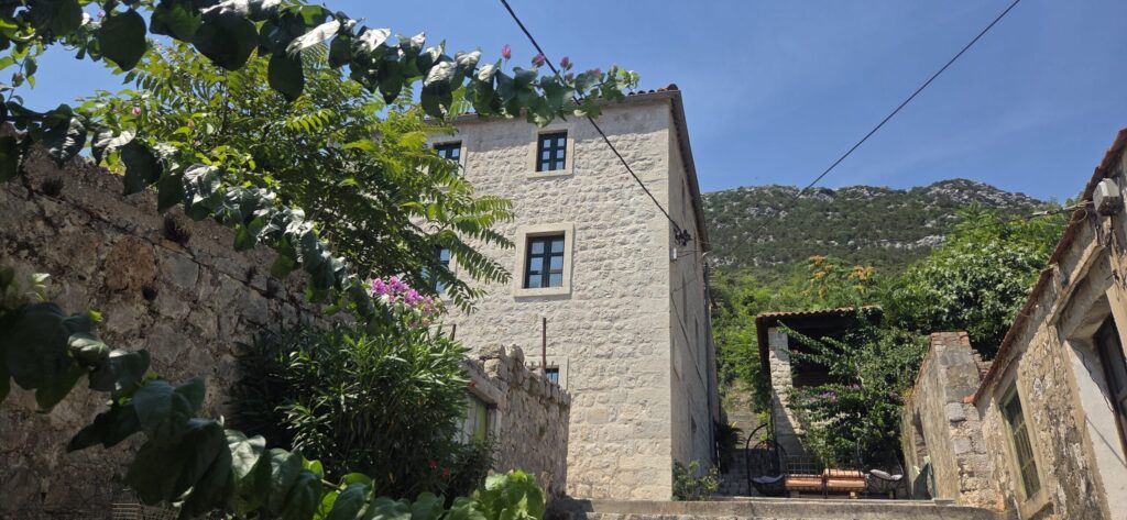 Traditional stone house and quiet street in Ston near Dubrovnik