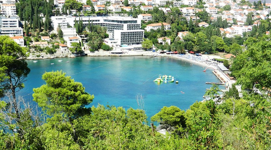 Lapad Bay Beach in Dubrovnik, Croatia – best family beach in Uvala Lapad with shallow turquoise water and seaside hotels