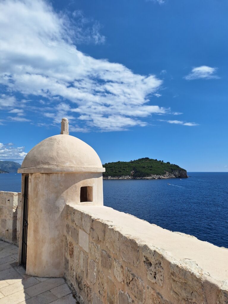 Dubrovnik city walls guard tower overlooking the Adriatic Sea and Lokrum Island