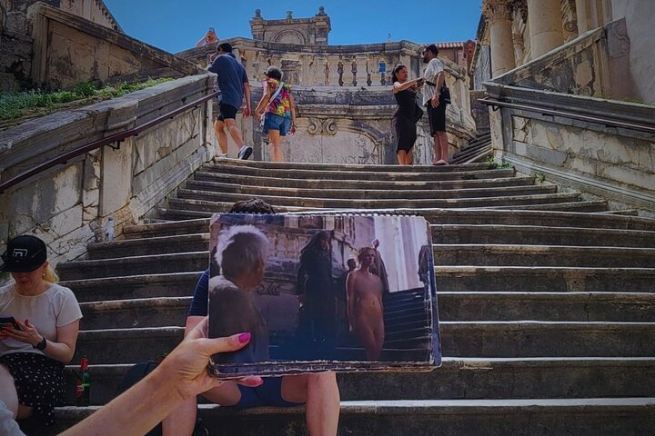 Game of Thrones tour in Dubrovnik at the Shame Steps with guide showing scene reference