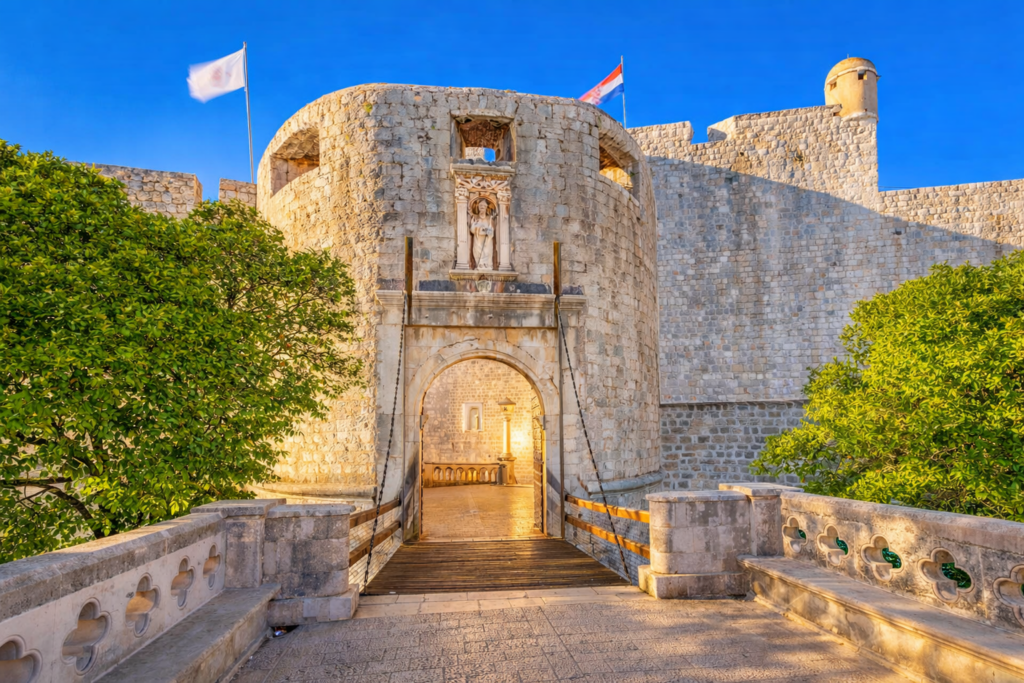 Pile Gate entrance to Dubrovnik Old Town with medieval city walls and stone bridge