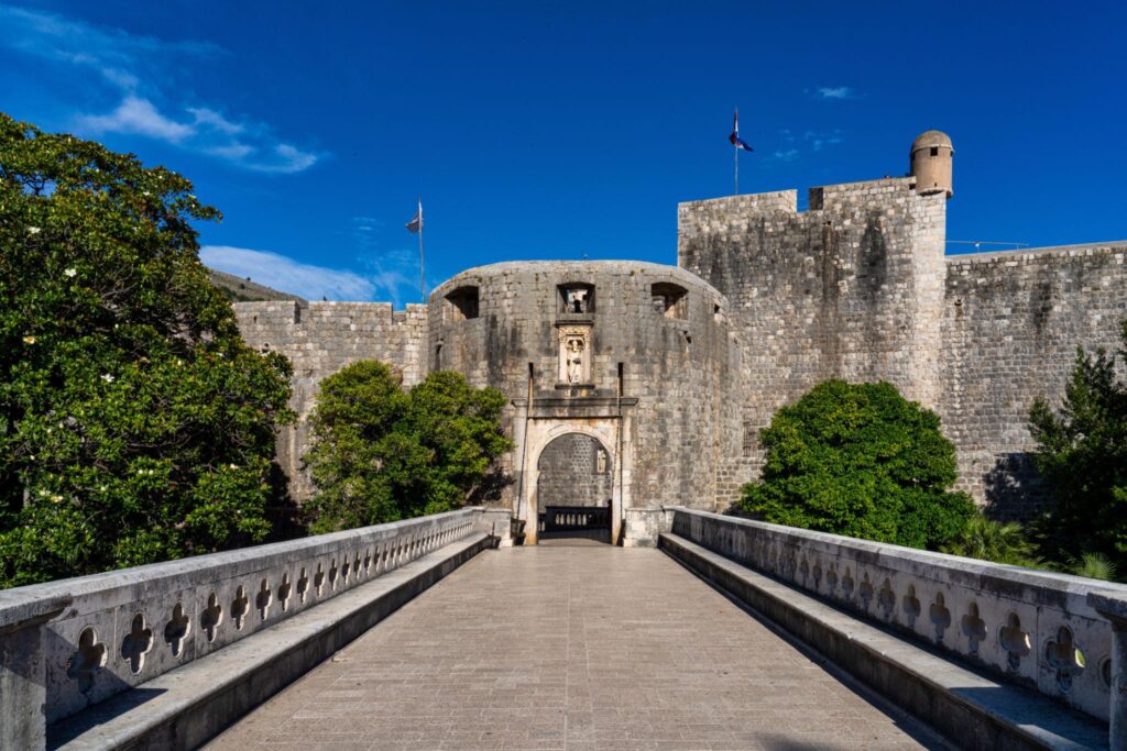 Pile Gate, the historic main entrance to Dubrovnik Old Town with stone bridge and medieval city walls.