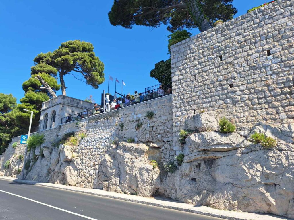 Historic street near Dubrovnik Old Town with Fratellos bar and clean well-kept surroundings