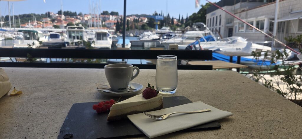 Coffee by the waterfront in Dubrovnik, Croatia, illustrating the slow-paced Croatian coffee culture that surprises many American travelers.