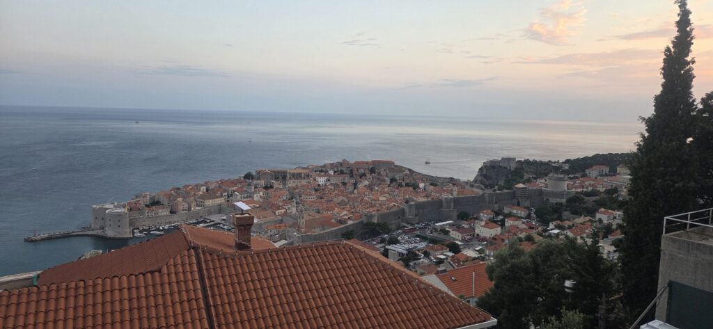 Panoramic view over Dubrovnik Old Town from the road above the city at sunset