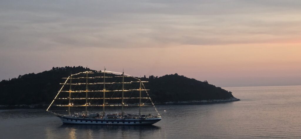 Sailing ship in front of Lokrum Island at sunset in Dubrovnik