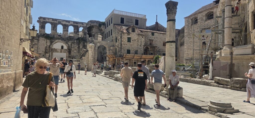 Diocletian’s Palace in Split with Roman ruins, stone streets and visitors walking through the Old Town