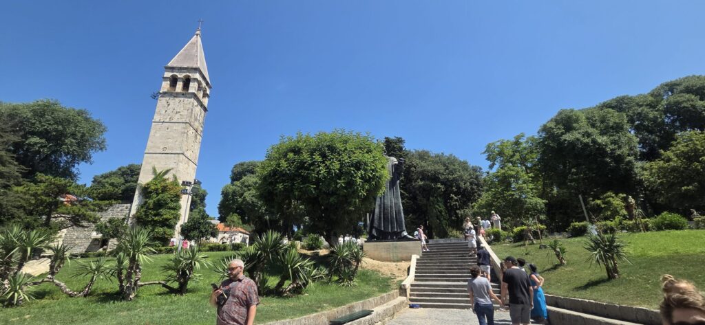 Split family-friendly Old Town area with park, bell tower and visitors walking