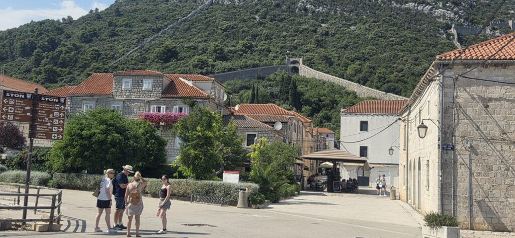 What to see in Ston with stone houses and Ston walls in the background