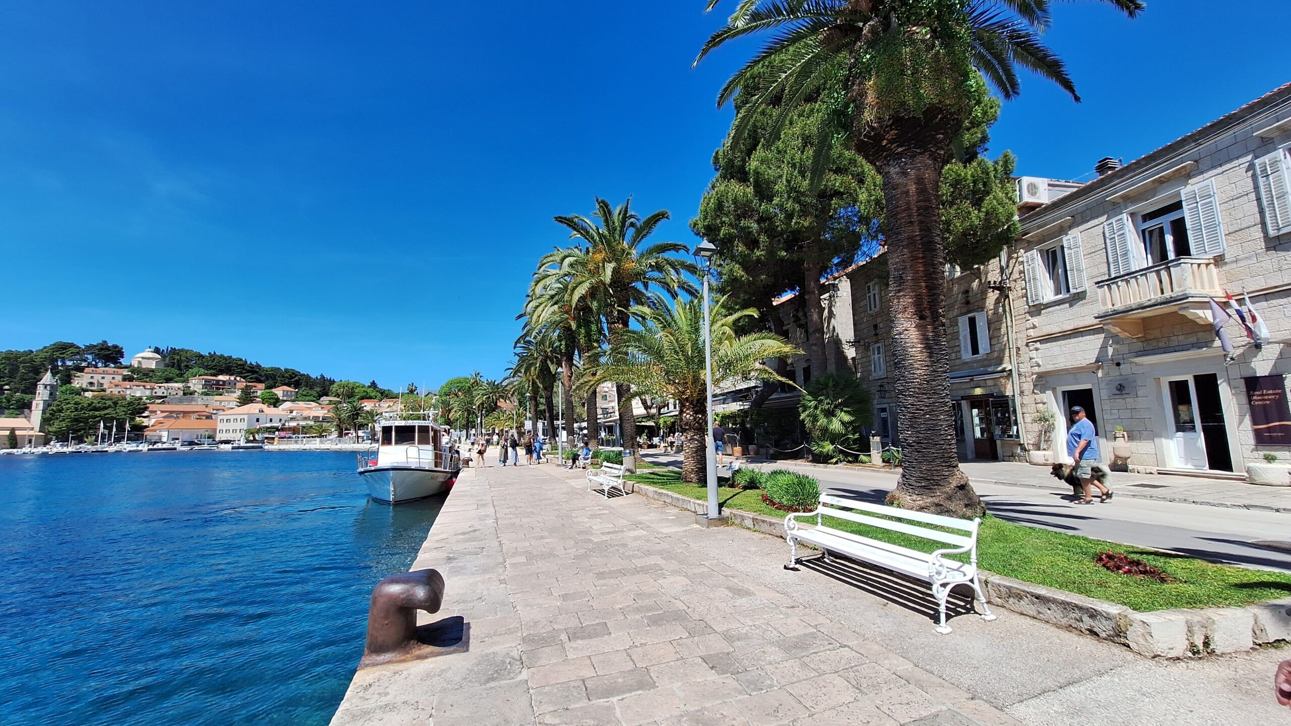 Cavtat harbour is the natural starting point for a short visit, with boats, cafés and an easy waterfront promenade.