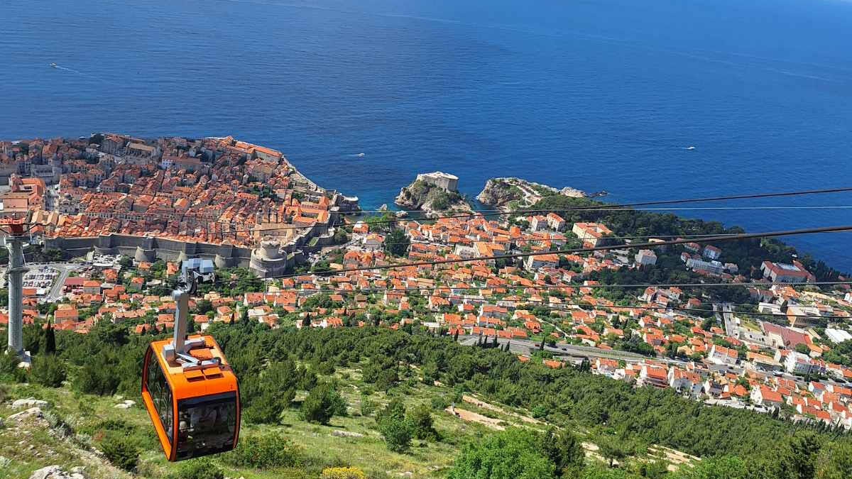 Dubrovnik cable car descending Mount Srđ with panoramic views of the Old Town and Adriatic Sea
