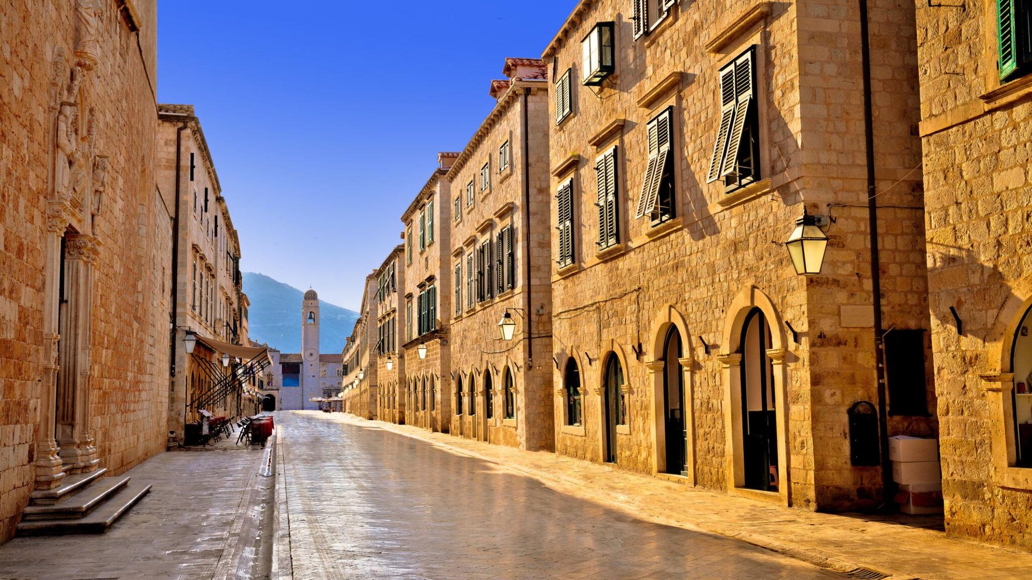 Stradun street in Dubrovnik Old Town during a quiet morning walking tour for cruise passengers.
