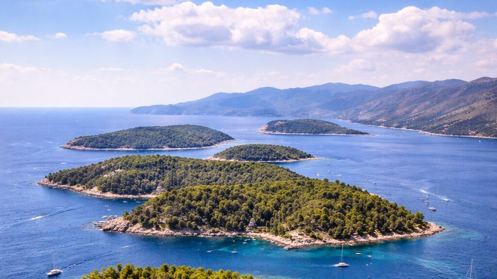 Aerial view of the forested Elaphiti Islands surrounded by the blue Adriatic Sea near Dubrovnik
