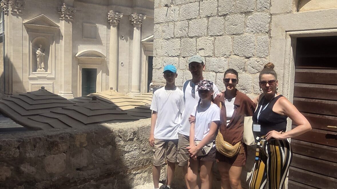 Family on a private walking tour near Dubrovnik Cathedral in the Old Town