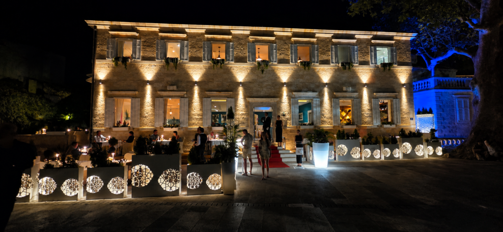 Nautika Restaurant in Dubrovnik illuminated at night near Pile Gate