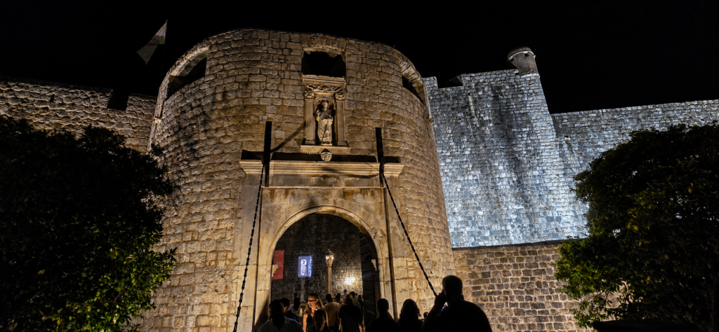 Pile Gate and Dubrovnik City Walls illuminated at night