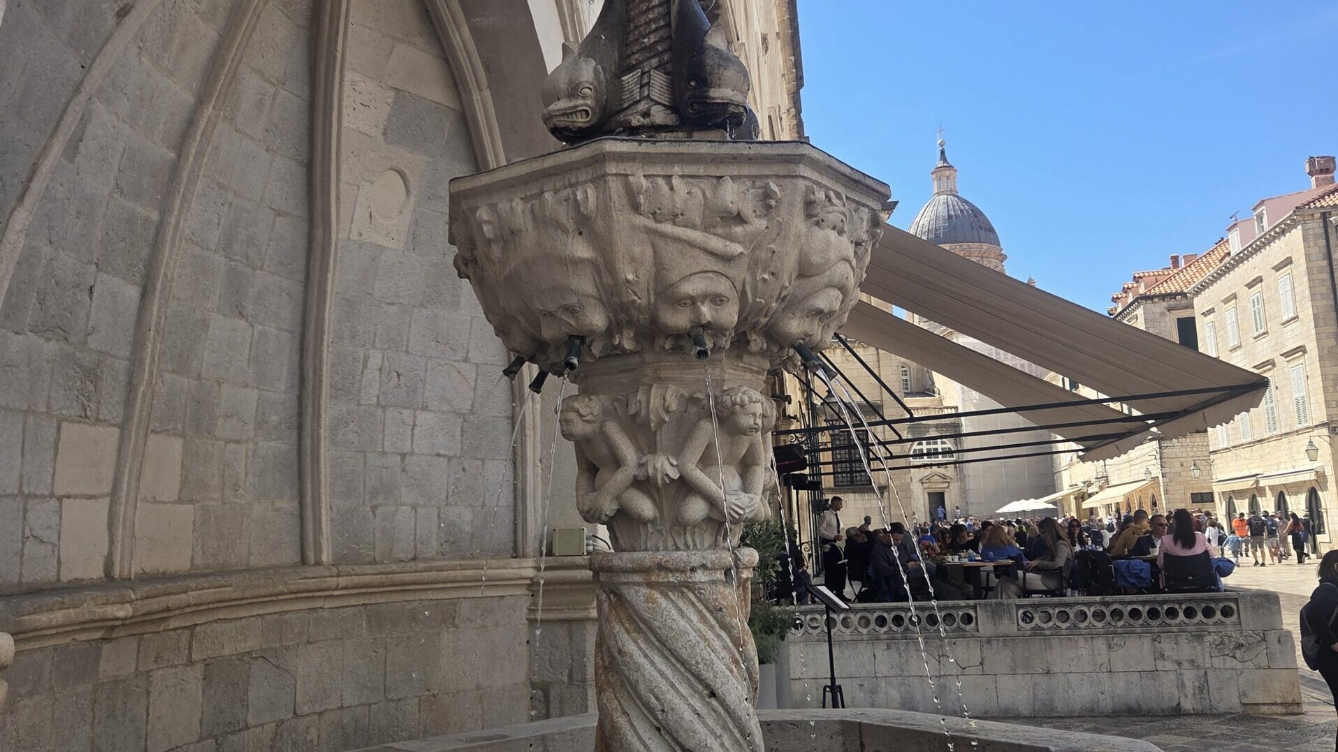 Small Onofrio’s Fountain beside the City Guard building near Luža Square at the eastern end of Stradun in Dubrovnik.